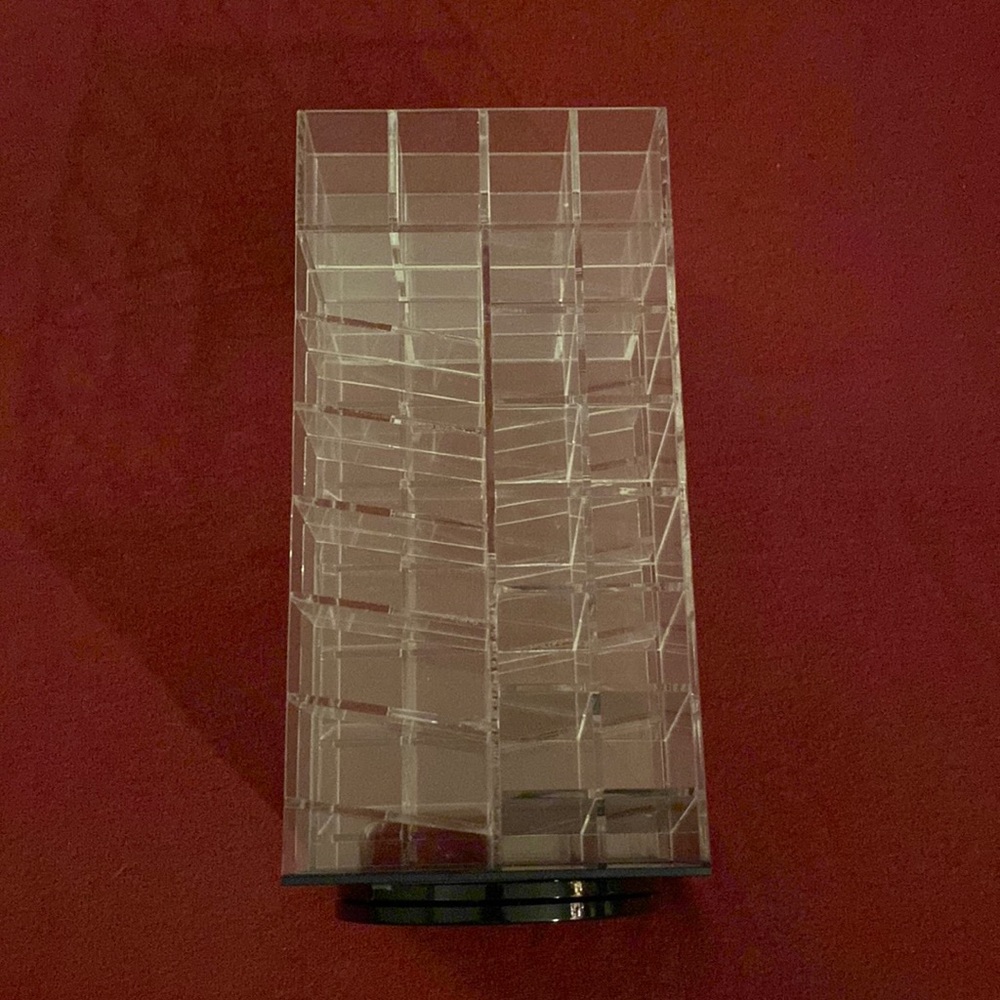 Acrylic spinning lipstick tower